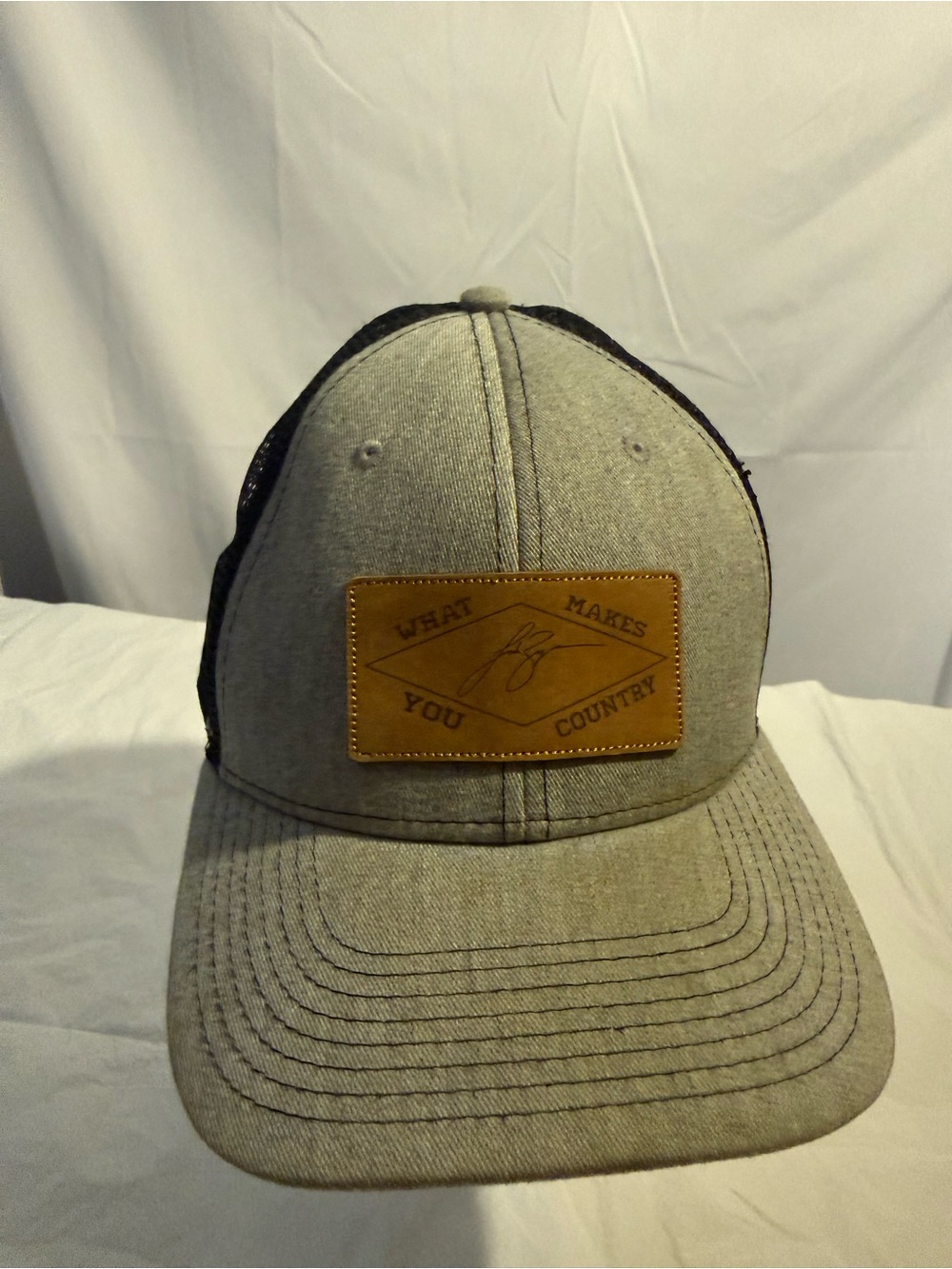 Grey Trucker Hat with Leather Patch - 'What Makes You Country'